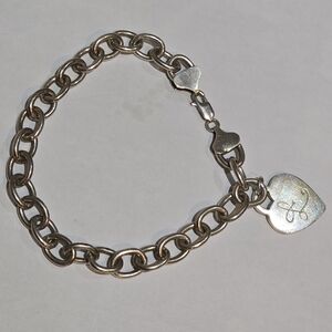 925 sterling silver bracelet with heart charm